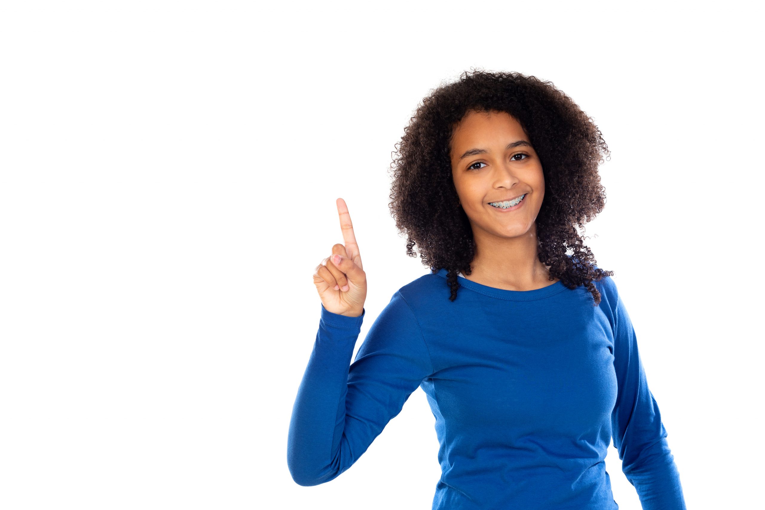 Teenager girl with afro hair wearing blue sweater isolated on a white background