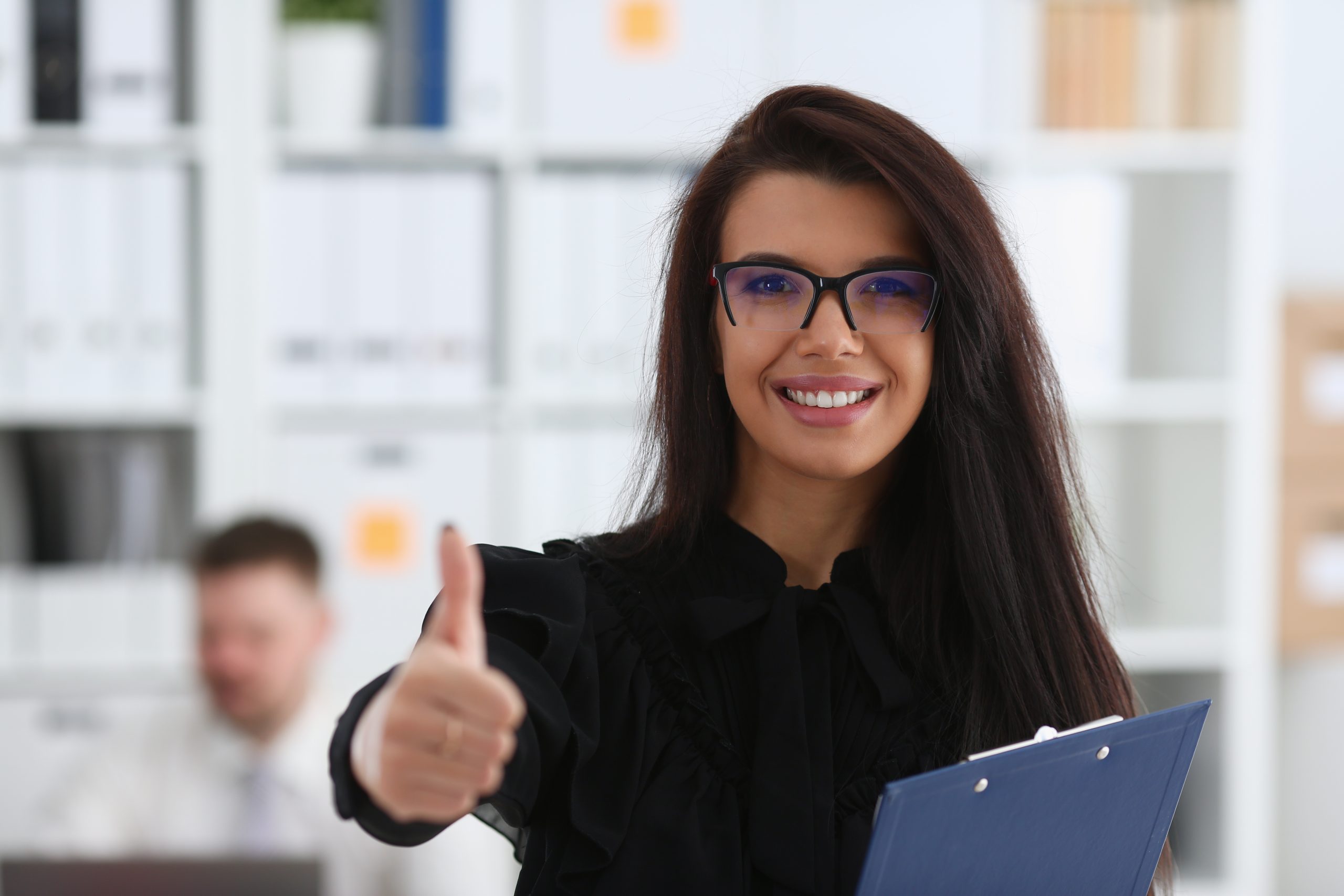 Female arm show OK or confirm during conference in office portrait. High level and quality product offer okay symbol expression perfect mediation solution happy client creative adviser participate